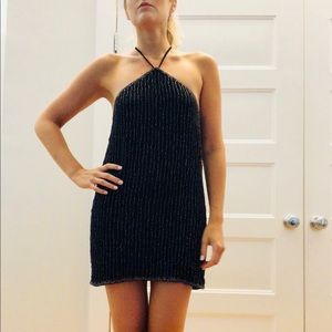 Fun, sparkly , cross-cross mini dress